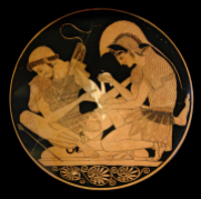Tondo of an Attic Red-Figure Kylix, ca. 500 BCE, depicting Achilles tending Patroklos' arm, wounded by an arrow. Source: Wikimedia Commons