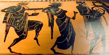 Detail from an Attic Black-Figure Stamnos ca. 500 BCE, depicting revelers dancing behind a man playing a lyre. Source: Wikimedia Commons