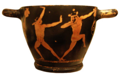 Attic Red-Figure Skyphos, ca. 470 - 460 BCE depicting two young men performing acrobatic stunts at a symposium. Source: Wikimedia Commons